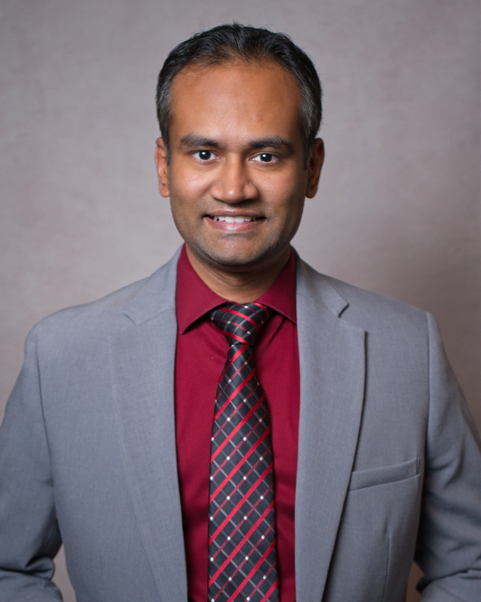 Professional portrait of Dinesh Edem, MD